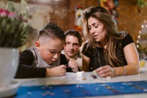 Two parents working to overcome the common homeschooling challenges they face