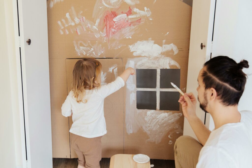 Holiday activities include arts and crafts like building a house out of cardboard