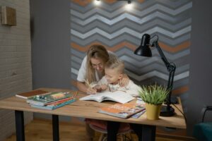 A mother engaging her child in year-round homeschooling